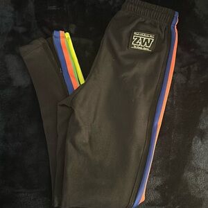 Zumba Sweatpants with 4 color stripe.  Fit is very small.
